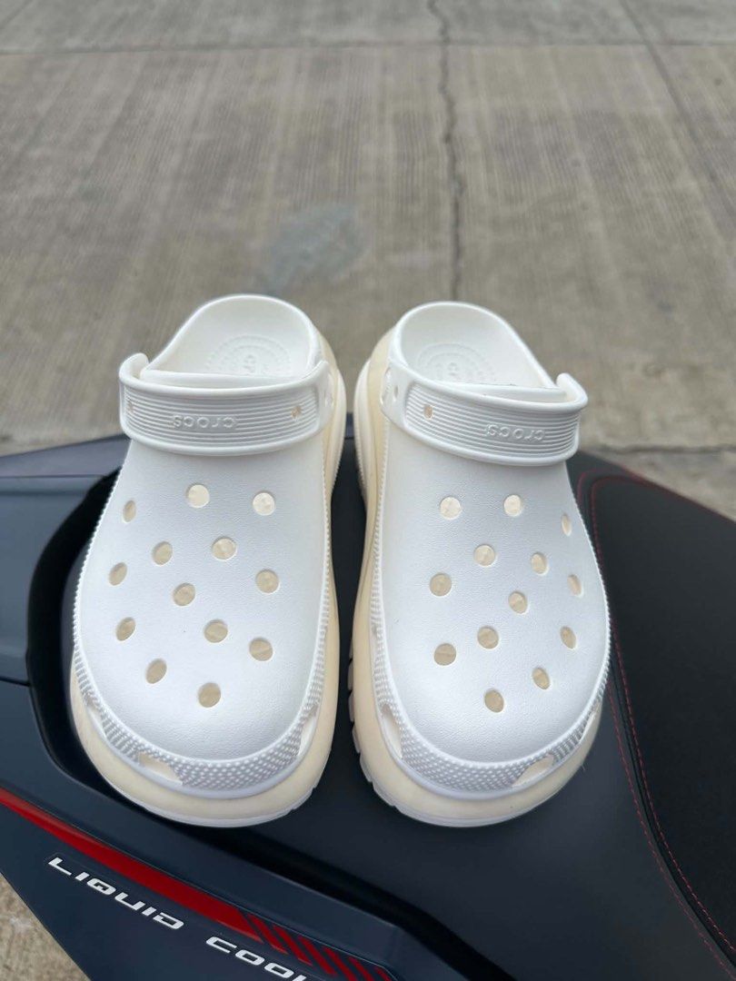 White Crocs Mega Crush Clogs (Category: Flats & Sandals) located in Cagayan de Oro. Submitted by vaststar_821a3e (Listing ID 1460430365, Image 2). Description: .