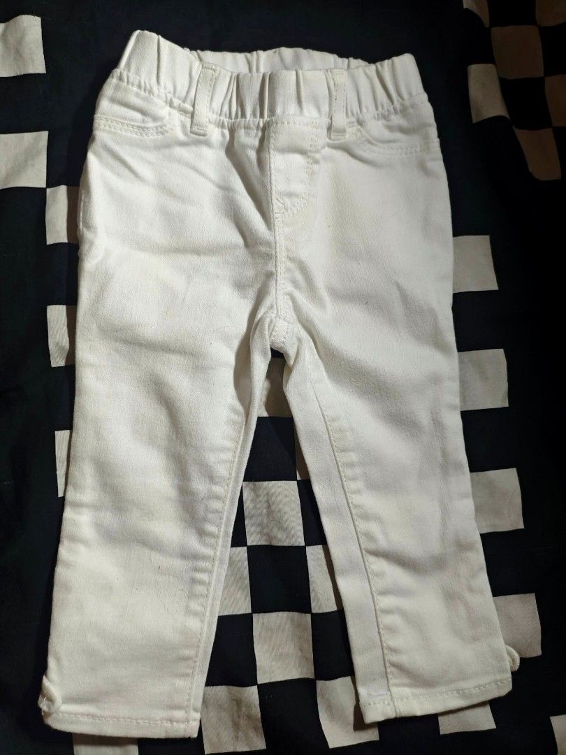 White stretch pants for kids (Category: Jeans) located in Pasig City. Submitted by love_happybee (Listing ID 1464890082, Image 1). Description: - Color: Solid white - Material: Clean white denim - Waistband: Stretchy and elastic for easy pull-on and take-off - Pockets: Faux front pockets and real back pockets - Extras: Functional belt loops included - Styling: Simple, versatile basic piece that easily matches most tops.