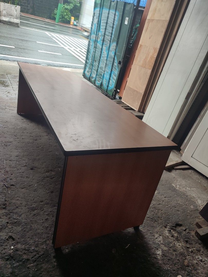 Wide Laminated Desk Table✨ (Category: Tables & Sets) located in Quezon City. Submitted by atgeremias313 (Listing ID 1464793984, Image 1). Description: Wide Laminated Table (2nd hand) Length- 8ft Width W- 77cm Height - 75cm 2pcs available 📲0985-887-8973.