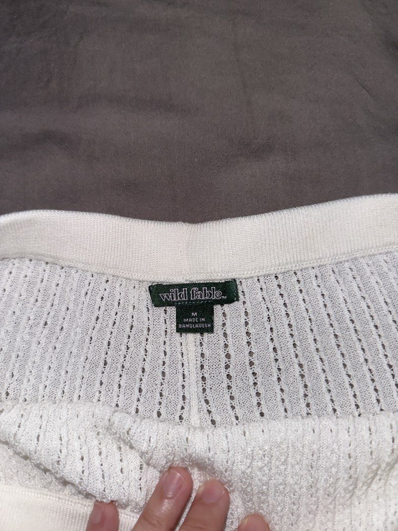 Wild Fable White Knit Shorts Size M (Category: Shorts) located in Santa Ana. Submitted by fatikilla (Listing ID 1464819039, Image 2). Description: - Brand: Wild Fable - Size: M - Color: White - Material: Open knit striped pattern (light and airy) - Features: Comfortable elastic waistband - Condition: Clean and well-maintained - Perfect for: Casual wear, warm weather, or beach days.