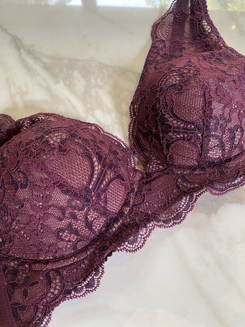 Wine burgundy lace bra 34C (Category: Undergarments & Loungewear) located in Makati City. Submitted by indaysukaycloset (Listing ID 1464890539, Image 2). Description: WINE / BURGUNDY LACE BRA Brand: Wacoal - BRA184 Size: C75 - fits 34C / 75C - Bust: 90, Underbust: 75 (Japan sizing) Color: Wine Red / Burgundy Details: - All-over embroidered lace with scalloped hem - Padded with underwire, push-up & full support - Wide mesh side wings for slimming 