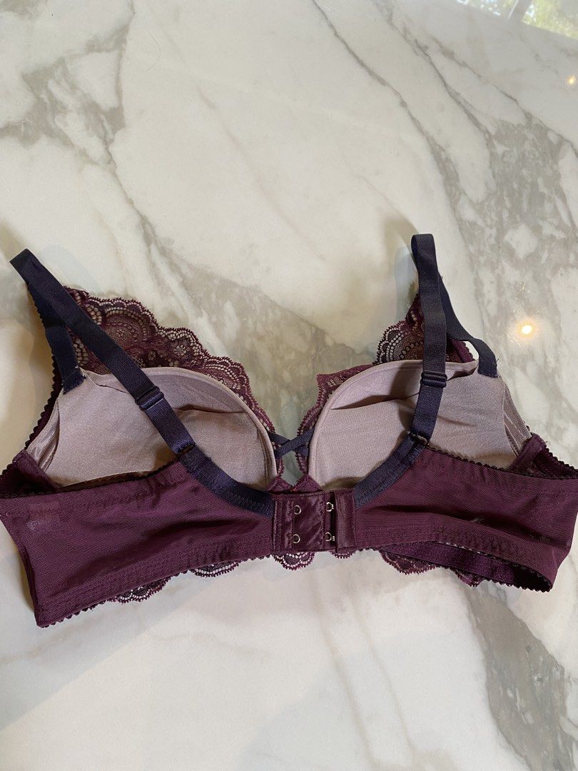 Wine burgundy lace bra 34C (Category: Undergarments & Loungewear) located in Makati City. Submitted by indaysukaycloset (Listing ID 1464890539, Image 3). Description: WINE / BURGUNDY LACE BRA Brand: Wacoal - BRA184 Size: C75 - fits 34C / 75C - Bust: 90, Underbust: 75 (Japan sizing) Color: Wine Red / Burgundy Details: - All-over embroidered lace with scalloped hem - Padded with underwire, push-up & full support - Wide mesh side wings for slimming 