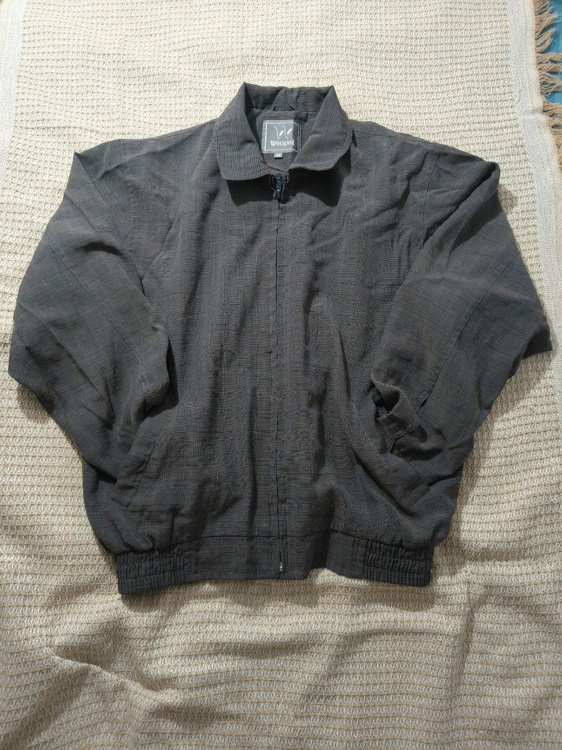 Winspol Grey Checked Casual Bomber Jacket Size M (Category: Coats, Jackets and Outerwear) located in Paranaque City. Submitted by vichhichi_ocean (Listing ID 1464809941, Image 1). Description: - Brand: Winspol - Color: Dark grey with subtle checked pattern - Size: Medium (M) - Closure: Full zip front with classic collar - Features: Elasticated waistband, button cuffs, and inner lining - Condition: Clean fabric texture throughout.