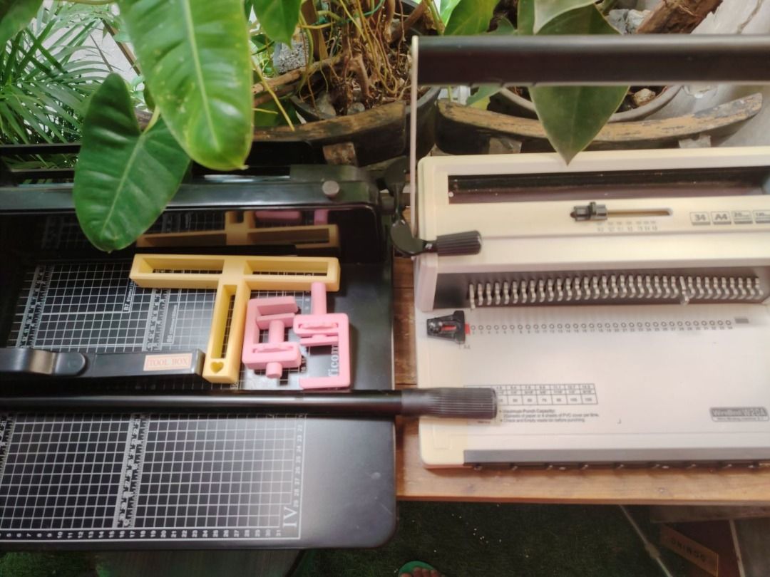 WireBind W20A Wire Binding Machine and Paper Cutter Bundle (Category: Craft Supplies & Tools) located in Caloocan City. Submitted by luckyepica (Listing ID 1464834430, Image 1). Description: - Model: WireBind W20A heavy-duty wire binding machine (3:1 pitch) - Includes a large black paper cutter board with a helpful alignment grid - Comes bundled with boxes of black wire binding spines in multiple sizes - Ideal for creating professional office rep