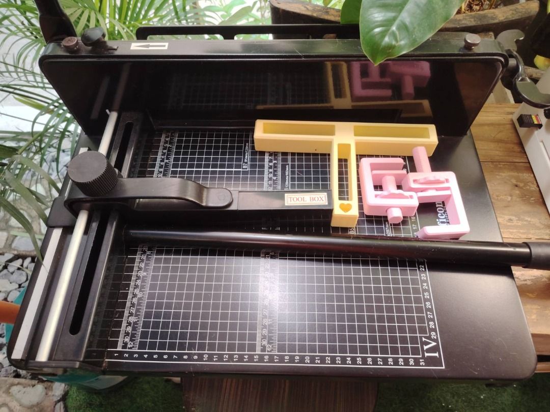 WireBind W20A Wire Binding Machine and Paper Cutter Bundle (Category: Craft Supplies & Tools) located in Caloocan City. Submitted by luckyepica (Listing ID 1464834430, Image 2). Description: - Model: WireBind W20A heavy-duty wire binding machine (3:1 pitch) - Includes a large black paper cutter board with a helpful alignment grid - Comes bundled with boxes of black wire binding spines in multiple sizes - Ideal for creating professional office rep