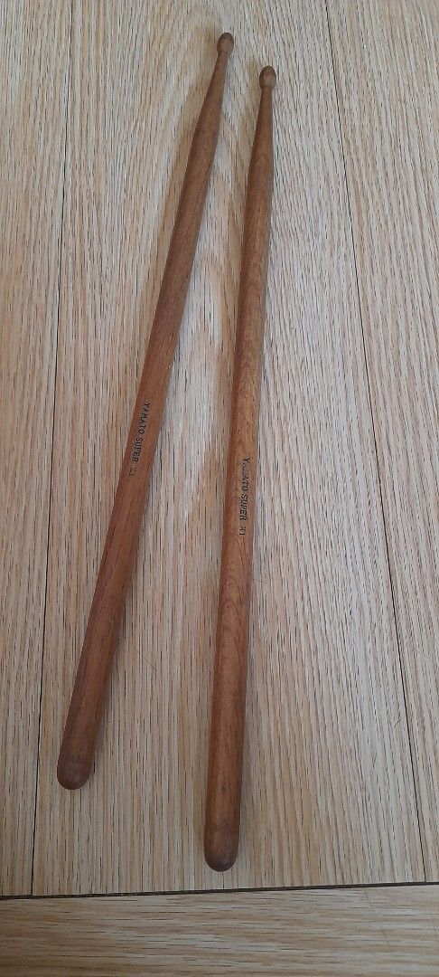 Wooden Drum Sticks Pair (Category: Musical Instruments) located in Bocaue. Submitted by marajapansurplus (Listing ID 1464805317, Image 3). Description: - Selling as it is - Pair of standard-size wooden drum sticks - Traditional round tips with natural wood grain finish - Standard length and weight, fits most drum stick holders - Ideal for budget-friendly practice and casual playing sessions.