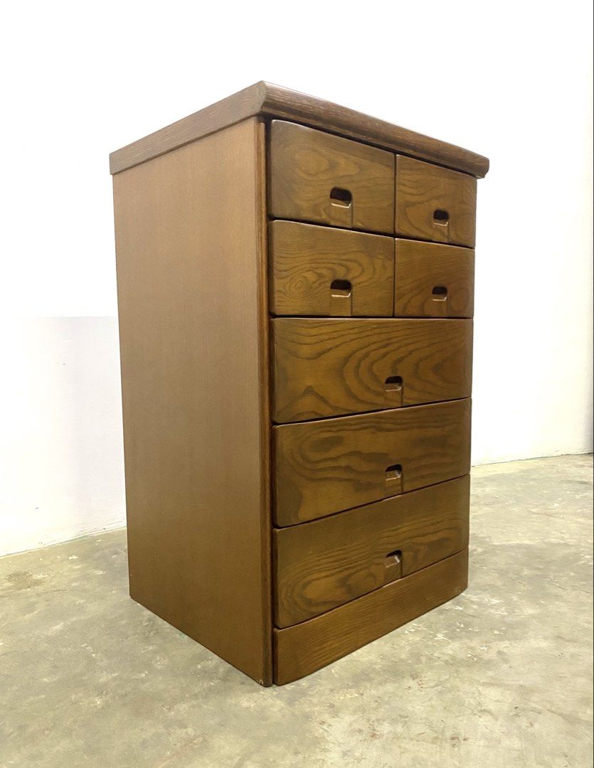 Wooden Multi-Drawer Cabinet Storage Chest (Category: Shelves, Cabinets & Racks) located in Santa Rosa. Submitted by annie_annie83 (Listing ID 1464873206, Image 1). Description: - Material: Solid wood with rich grain finish - Storage: 6 stacked drawers (4 upper compartments, 3 wider lower drawers) - Design: Clean structure with integrated carved pull handles - Color: Warm brown tone - Ideal for: Hallway or bedroom storage.