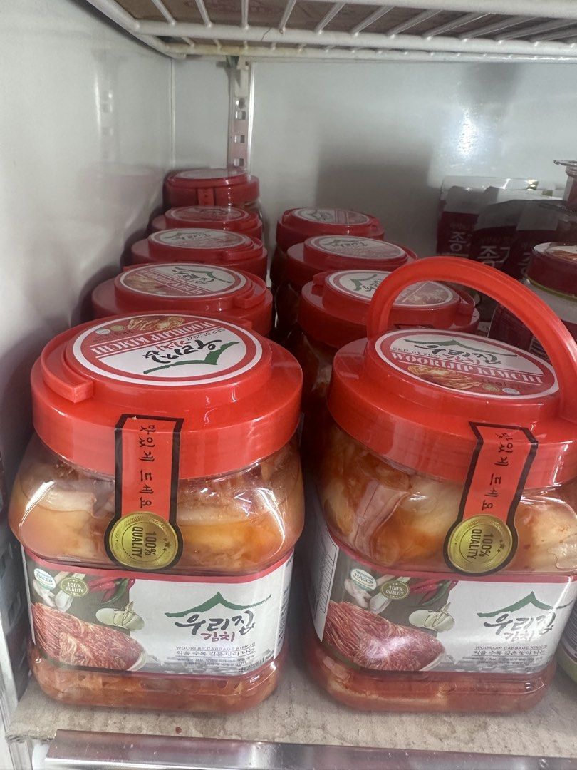 Woorijip Cabbage Kimchi 1kg (Category: Fresh Produce) located in Muntinlupa City. Submitted by Somefinds (Listing ID 1464815254, Image 1). Description: - Product: Woorijip Cabbage Kimchi - Size: 1kg in a sturdy plastic jar with a red handle and secure lid - Taste: Authentic Korean flavor made with traditional ingredients (cabbage, garlic, chili) - Condition: Brand new, unopened with quality seal sticker intact - Storage: Keep refrigerated - Best 