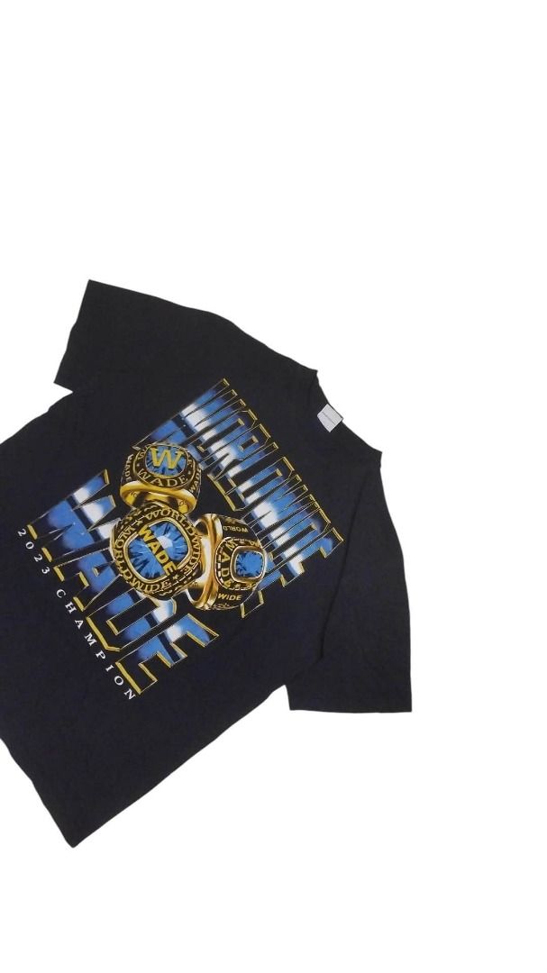 WORLDWIDE WADE RINGER TEE (Category: Tshirts & Polo Shirts ) located in Koronadal. Submitted by theminance (Listing ID 1464775418, Image 2). Description: -22.5X28 ( LARGE ) - Color: Black - Design: Large front graphic featuring 'WORLDWIDE WADE', three championship rings in blue and gold tones, and '2023 CHAMPION' text at the bottom - Fit: Standard fit / Regular cotton tee style - Neckline: Crew neck - Sleeves: Short sleeves - Condition: Brand new