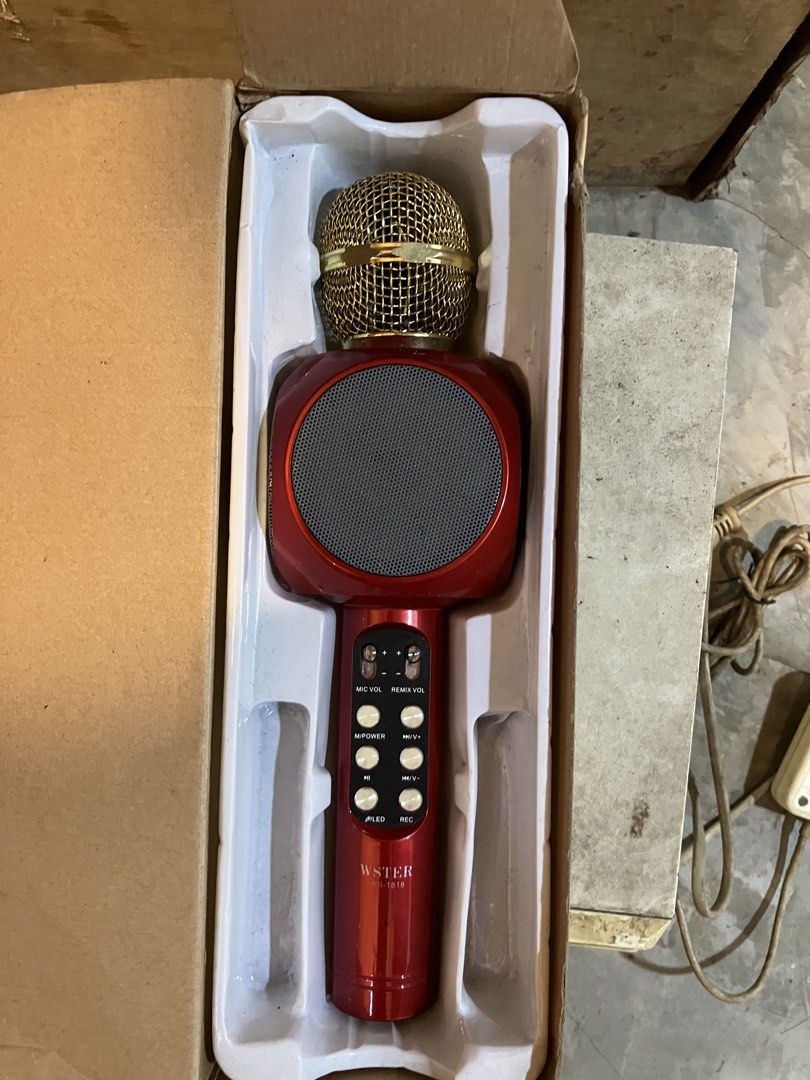 Wster WS-1816 Wireless Microphone Handheld KTV Speaker (Category: Microphones) located in Quezon City. Submitted by ponpin (Listing ID 1464833953, Image 3). Description: - Model: WS-1816 Wireless Karaoke Microphone (Color: Red) - Features: Built-in speaker with vibrant disco lights - Connectivity & Media: Supports TF card, USB, and FM radio - Specs: 3W output power and reliable 1800mAh built-in battery - Inclusions: Comes with original box and pl
