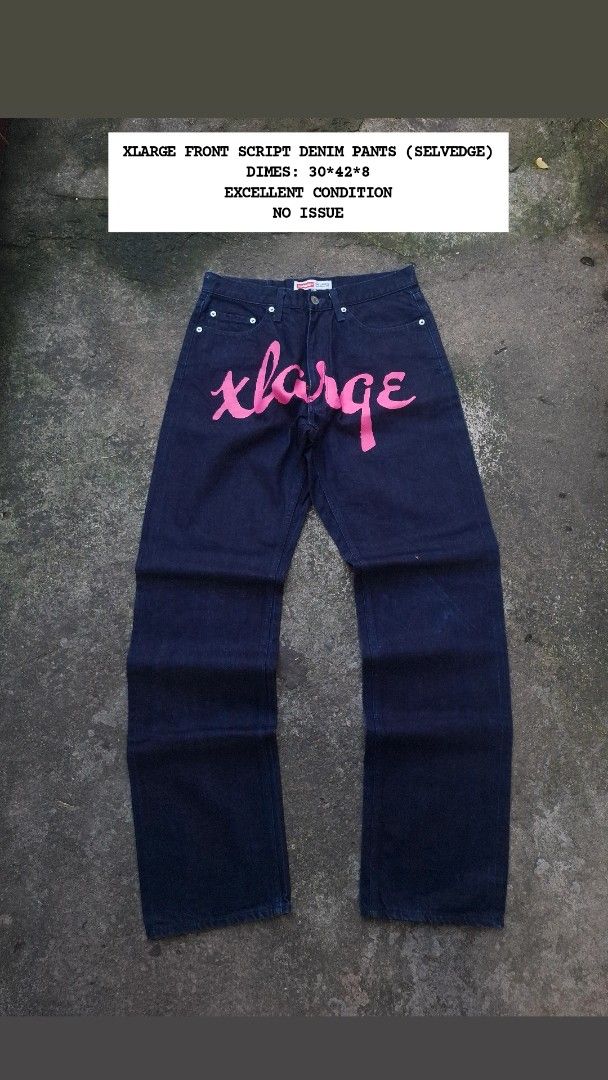 Xlarge Front Script Denim Pants Selvedge - Size 30 (Category: Jeans) located in Manila. Submitted by bonaobrag55538 (Listing ID 1464845094, Image 1). Description: - Brand: Xlarge - Style: Dark wash selvedge denim pants - Dimes: 30*42*8 - Details: Bold pink script logo on front, classic cuff detail, and back leather patch - Condition: Excellent, clean inside and out with zero flaws and preserved dark indigo color - Material: Heavyweight denim with