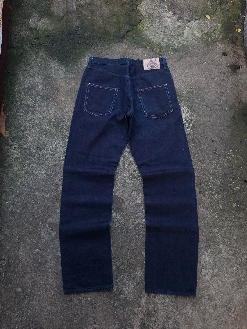 Xlarge Front Script Denim Pants Selvedge - Size 30 (Category: Jeans) located in Manila. Submitted by bonaobrag55538 (Listing ID 1464845094, Image 2). Description: - Brand: Xlarge - Style: Dark wash selvedge denim pants - Dimes: 30*42*8 - Details: Bold pink script logo on front, classic cuff detail, and back leather patch - Condition: Excellent, clean inside and out with zero flaws and preserved dark indigo color - Material: Heavyweight denim with