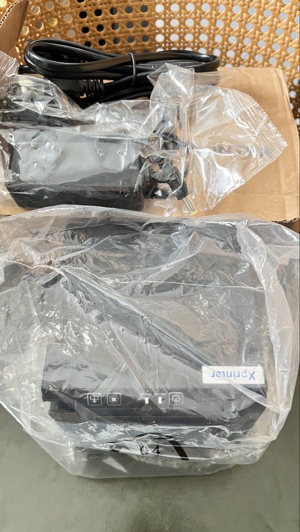 Xprinter XP-T202UA Thermal Barcode Printer (Category: Printers, Scanners & Copiers) located in Manila. Submitted by caprence0228 (Listing ID 1464790049, Image 3). Description: - Brand: Xprinter - Model: XP-T202UA - Condition: Brand new, unused, still in original plastic wrapping - Resolution: 203DPI - Print Speed: Up to 101mm per second - Max Print Width: 48mm - Interface: USB - Inclusions: Power adapter and cable.