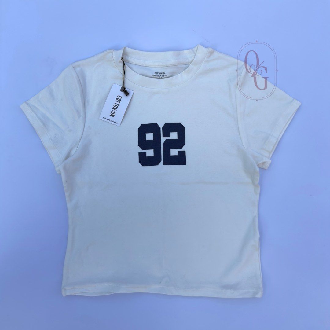 Y2K Graphic Tee "92" (Category: Shirts) located in Santa Rosa. Submitted by cosmicls (Listing ID 1464915240, Image 1). Description: a bit body hugging, mini tee - this is a branded overrun item, please manage your expectations. - this is not officially in stock at the mall branches. .