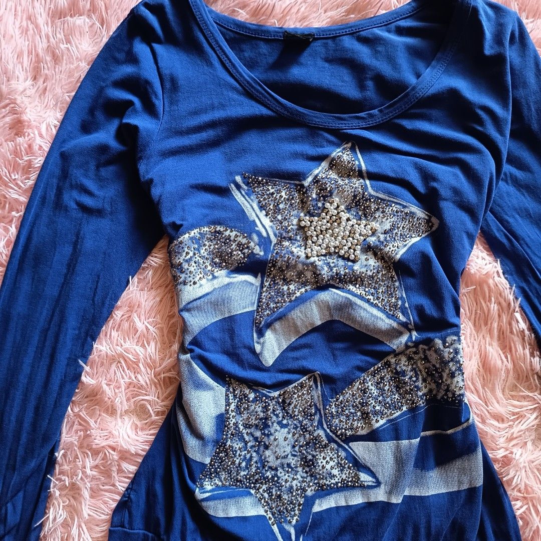 Y2K royal blue star sequin graphic top (Category: Longsleeves) located in Adams. Submitted by luckygirl.closet (Listing ID 1464916273, Image 2). Description: s-m can pass as brand new has sequin detail on lower arm part can be worn as off shoulder (see last pic).