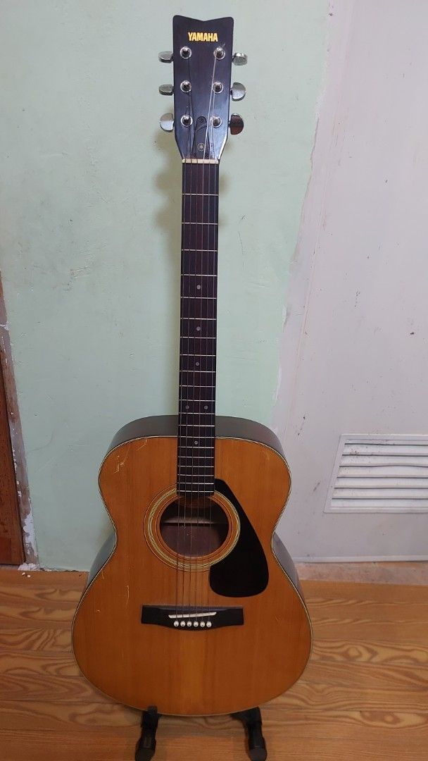 Yamaha FG-122 Acoustic Guitar (Category: Musical Instruments) located in Baliuag. Submitted by papa.gardz (Listing ID 1464904566, Image 1). Description: - Vintage Yamaha FG-122 acoustic guitar from the iconic Nippon Gakki era (Made in Japan) - Beautiful rosewood back and sides with warm grain patterns - Condition: Shows visible surface scratches and minor wear consistent with age and regular playing.