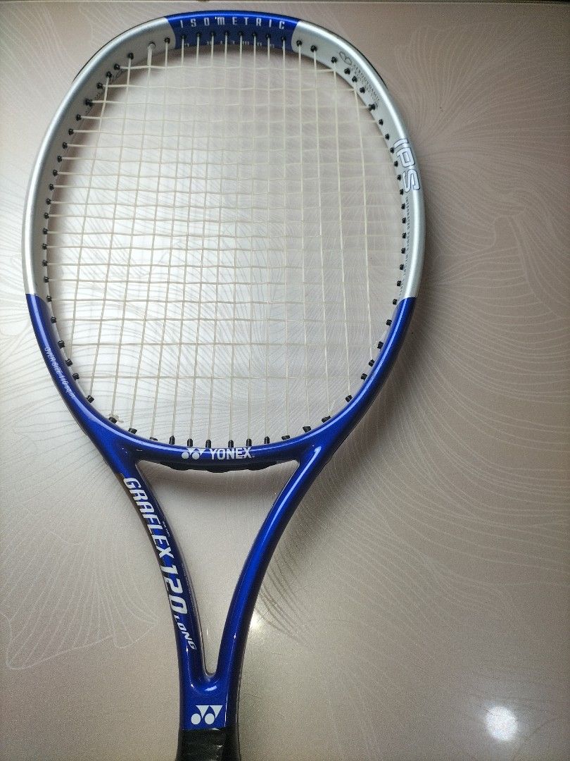 Yonex Graflex 120 Long Tennis Racket (Category: Racket and Ball Sports) located in Cainta. Submitted by banzvi73 (Listing ID 1464896264, Image 2). Description: - Brand/Model: Yonex Graflex 120 Long Tennis Racket - Colorway: Blue and silver - Head Shape & Size: Isometric, Oversize 110 square inches for a bigger sweet spot - Weight: 290g (lightweight and maneuverable) - Grip Size: Size 1 - Extras: Clean strings, fresh blue overgrip installed, and I
