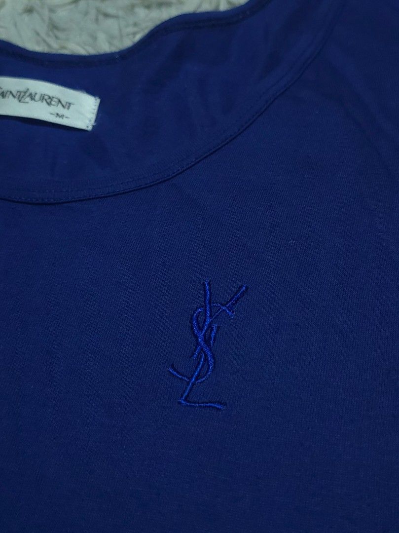 YSL (Category: Dresses) located in Abulug. Submitted by humanwhosellthings (Listing ID 1464898849, Image 3). Description: YSL Embroidered Logo Blue Dress ✅️Size: Medium ✅️Dimes: 18W x 42L ✅Condition: Excellent ✅Issue: None ✅Color Rate: 9.8/10.