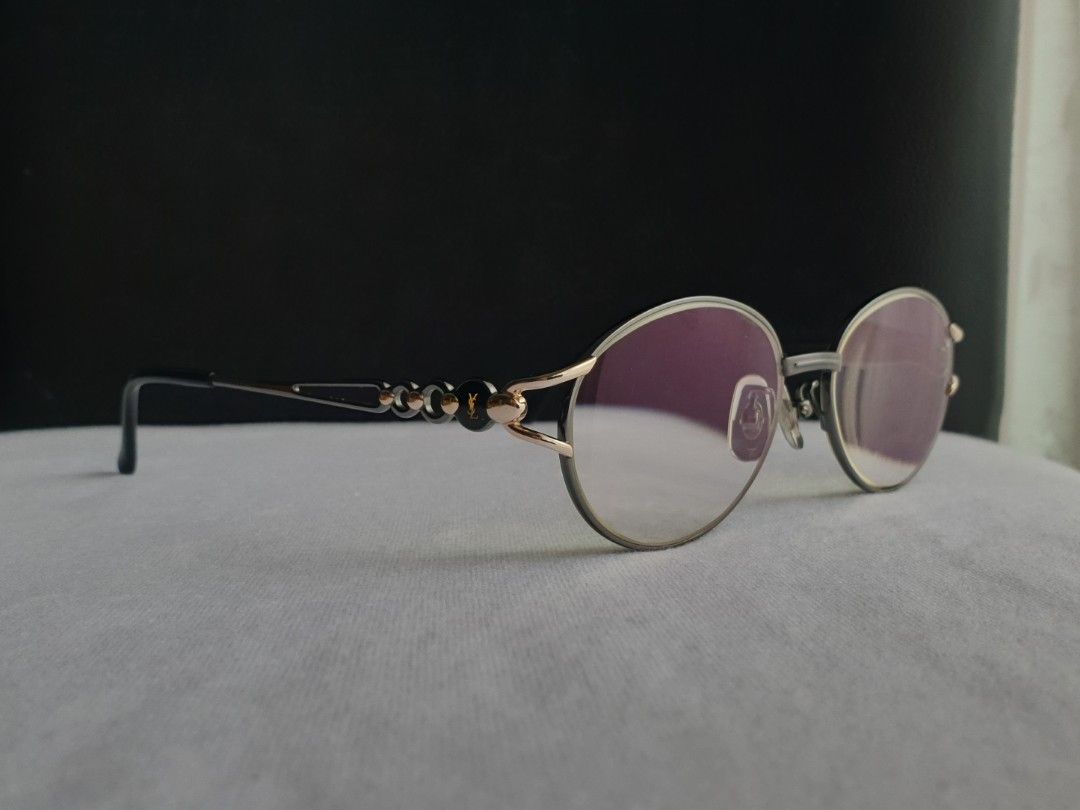 Yves Saint Laurent X Murai Eyeglass Frame (Category: Sunglasses & Eyewear) located in Quezon City. Submitted by WasalakTwo (Listing ID 1464953537, Image 1). Description: Bought in Japan Authentic Goodcondition Clean and presentable Lens are graded, but replaceable Open for delivery nationwide Front Width 12.7cm Front Height 3.9cm.