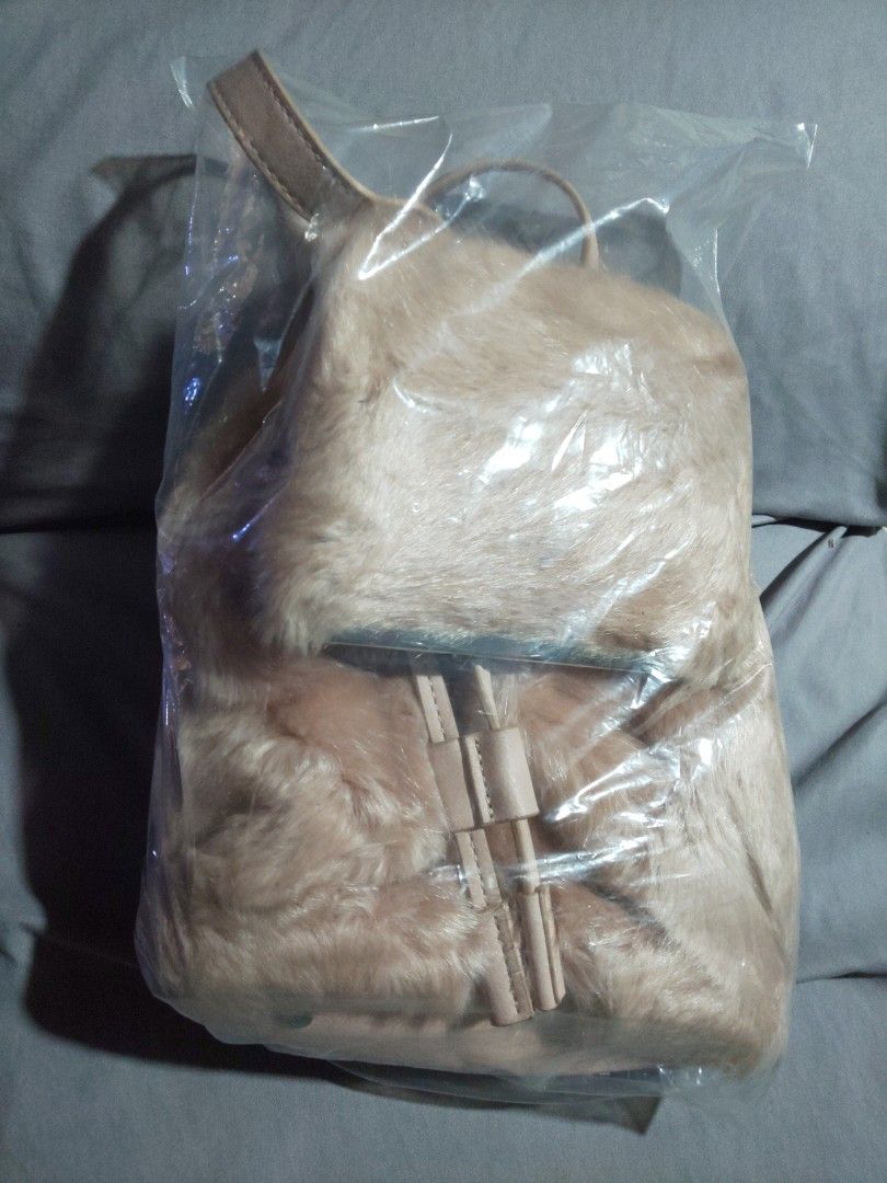 Zara Basic Collection Backpack (Category: Backpacks) located in Dasmarinas. Submitted by 3mi3shop (Listing ID 1464783256, Image 2). Description: Zara fur backpack silver magnetic lock and drawstring 10x9.5 inches payment thru gcash only add'l shipping fee via JNT.