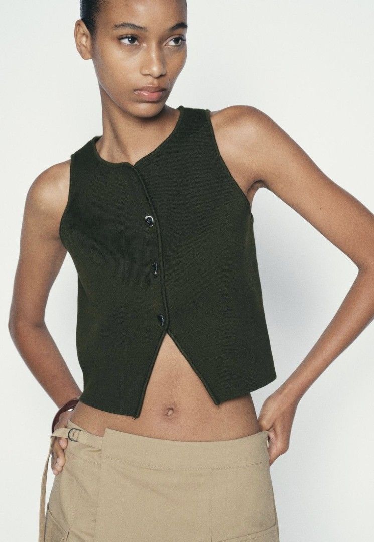 ZARA dark green knit sleeveless button down (Category: Others Tops) located in Quezon City. Submitted by rmseller.2017 (Listing ID 1464801921, Image 2). Description: ZARA dark green knit sleeveless button down | XS-M | P800 only.