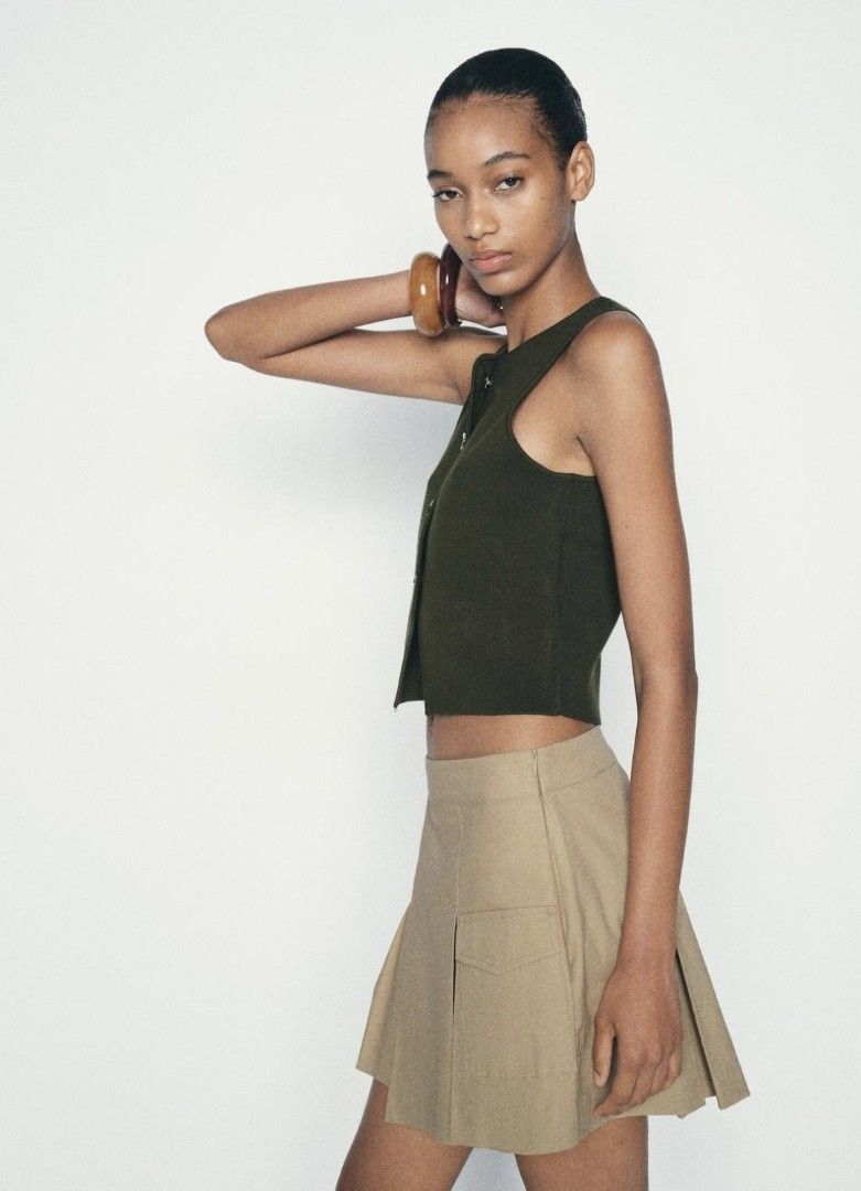 ZARA dark green knit sleeveless button down (Category: Others Tops) located in Quezon City. Submitted by rmseller.2017 (Listing ID 1464801921, Image 3). Description: ZARA dark green knit sleeveless button down | XS-M | P800 only.