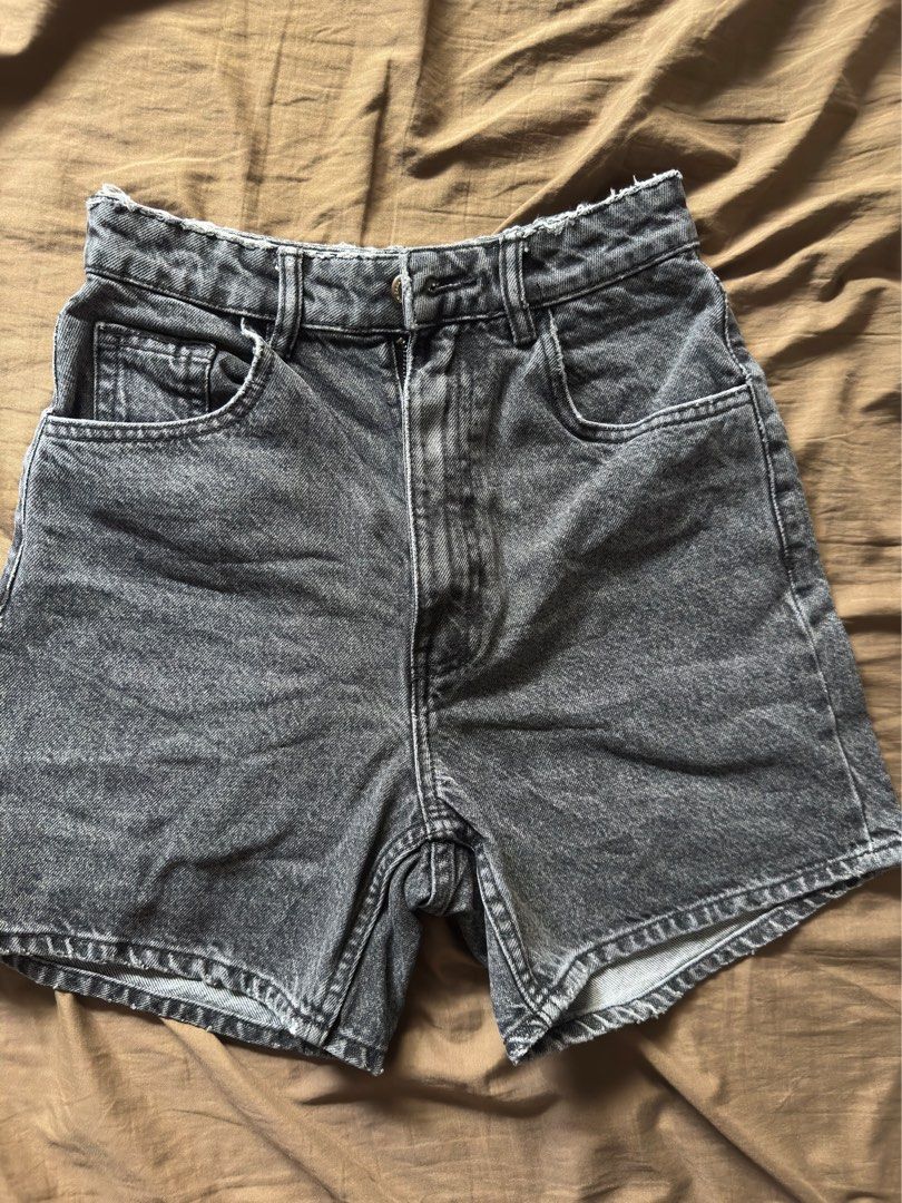Zara Grey Denim Shorts (Category: Shorts) located in Nasipit. Submitted by pyanstar (Listing ID 1464804831, Image 1). Description: - Brand: Zara TRF Collection - Style: Washed grey denim shorts with a heavily faded finish - Details: Classic five-pocket design, button fly with branded hardware, leather-look patch on back waistband - Hem: Trendy frayed raw hem - Origin: Made in Bangladesh - Condition: Excellent pre-loved/brand new (as applicable) -