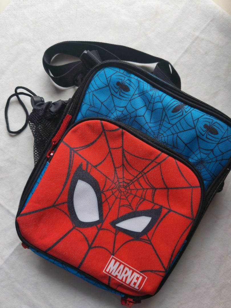 Zppieslab Marvel Spiderman Insulated Lunch Bag with Strap (Category: Tote Bags) located in Taguig. Submitted by bacinamarg71602 (Listing ID 1464809698, Image 1). Description: - Authentic Zppieslab Marvel Spiderman insulated lunch bag - Bright red and blue design featuring official Spiderman graphics - Foil-lined interior keeps meals warm or cold for hours - Convenient mesh side pocket for water bottles - Extra zippered front compartment for utens