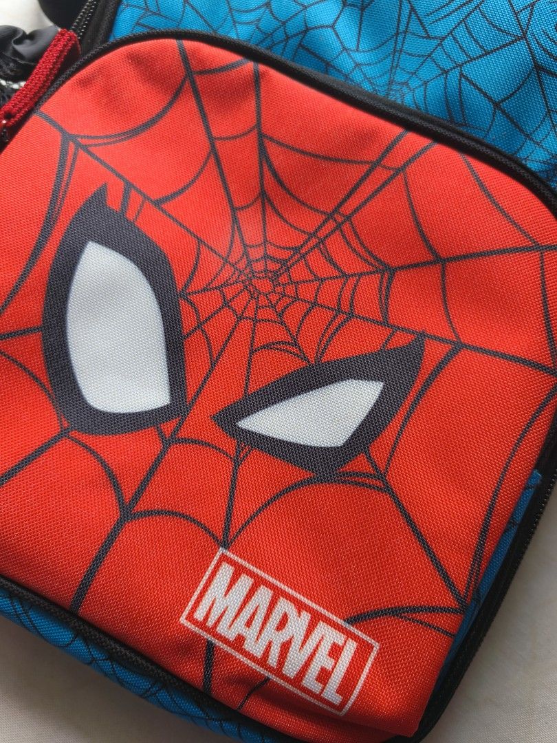 Zppieslab Marvel Spiderman Insulated Lunch Bag with Strap (Category: Tote Bags) located in Taguig. Submitted by bacinamarg71602 (Listing ID 1464809698, Image 2). Description: - Authentic Zppieslab Marvel Spiderman insulated lunch bag - Bright red and blue design featuring official Spiderman graphics - Foil-lined interior keeps meals warm or cold for hours - Convenient mesh side pocket for water bottles - Extra zippered front compartment for utens