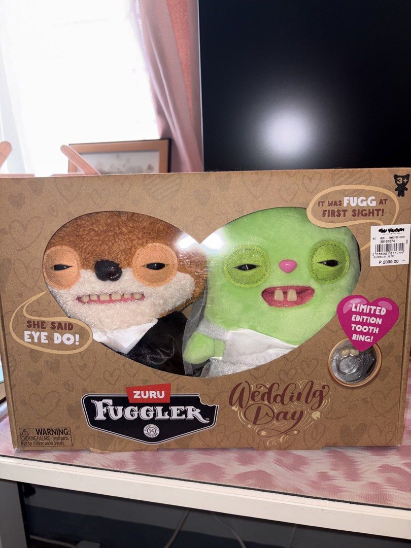 Zuru Fuggler Wedding Day Set (Category: Plushies & Soft Toys) located in Manila. Submitted by donnaburde79462 (Listing ID 1464794160, Image 1). Description: - Zuru Fuggler Wedding Day plush set featuring two quirky, dressed-up monsters - Comes brand new in its original packaging - Includes a highly collectible limited-edition tooth ring inside - Great and unique gift idea for Fuggler fans and plush collectors - 100% authentic and ready to ship - 