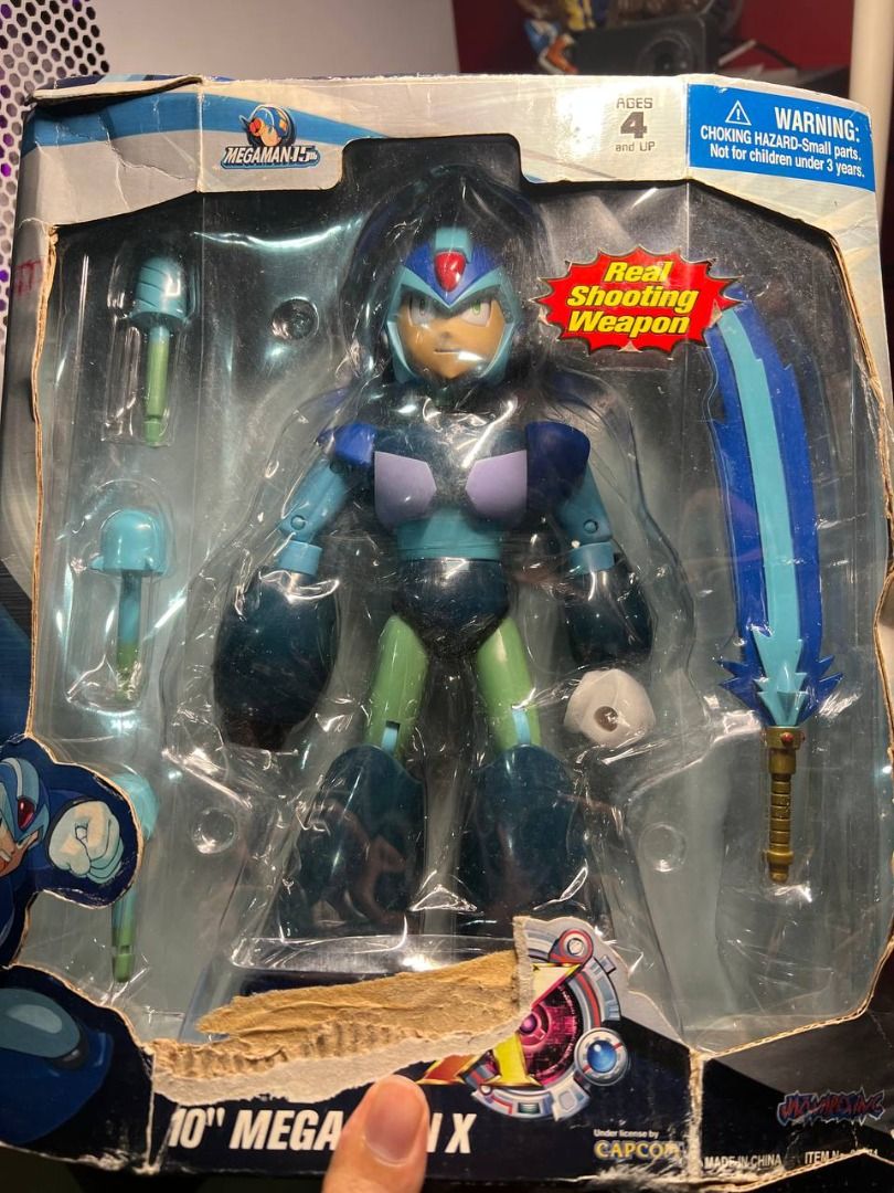 10" CAPCOM Mega Man X Action Figure (Category: Action & Battle Toys) located in Baguio. Submitted by ditoyzb08176 (Listing ID 1459400505, Image 2). Description: - Mega Man X 10-inch action figure - Includes real shooting weapon and accessories - Box shows some wear and tear - Great for collectors Location: Baguio city Shipping: J&T/FLASH/LBC .