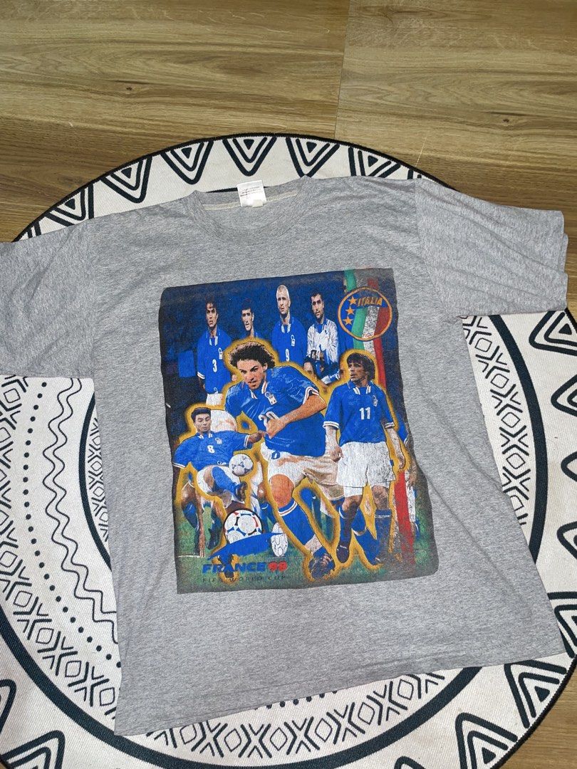 1998 fifa world cup (Category: Tshirts & Polo Shirts ) located in Manila. Submitted by clementdav22513 (Listing ID 1459405851, Image 1). Description: - Grey t-shirt celebrating the France 98 FIFA World Cup. - Features the Italia team graphic on the front. - Back has the France 98 FIFA World Cup logo. - Made from comfortable cotton material. - Perfect for football fans..