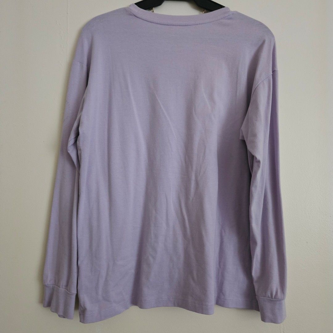 24. ZALORA ACTIVE Long Sleeve Top Lavender Medium (Category: Longsleeves) located in San Juan City. Submitted by titaofmanilaessentials (Listing ID 1459304471, Image 3). Description: - ZALORA lavender long sleeve top - Soft and comfortable material, perfect for everyday wear - Features a faint mark on the sleeve (refer to the second photo for details) - Measurements: Shoulder to shoulder approx. 17 inches, pit to pit approx. 20 inches - A great b
