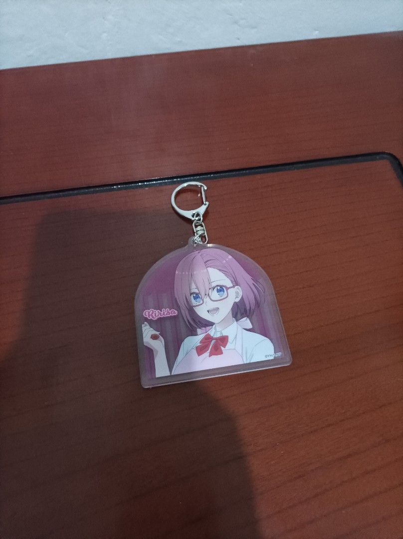 2.5 Dimensional Seduction Ririsa (Category: Character Goods) located in Bacoor. Submitted by kuroochiii94695 (Listing ID 1459297308, Image 1). Description: - Cute acrylic keychain featuring Ichika Nakano from The Quintessential Quintuplets. - Ichika is depicted wearing an apron and holding a strawberry. - Ideal for fans of anime and The Quintessential Quintuplets. - Perfect for personalizing bags, keys, or backpacks. - A great collectible item fo