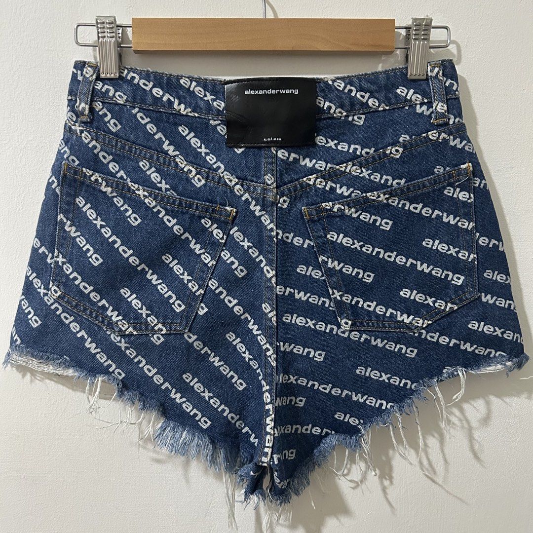 [27”] ALEXANDER WANG High Rise Cut Off Bite Denim Shorts (Category: Shorts) located in Tanza. Submitted by shop_qrated (Listing ID 1459478905, Image 3). Description: ALEXANDER WANG High Rise Cut Off Bite Denim Shorts. With side slits. 100% Cotton, non-stretch. Measures 27” via medida sizing. NGA. Clean and ready to wear. Logomania for the win. Printed with an all-over logo, these Bite denim shorts from Alexander Wang sit high at the waist and fea
