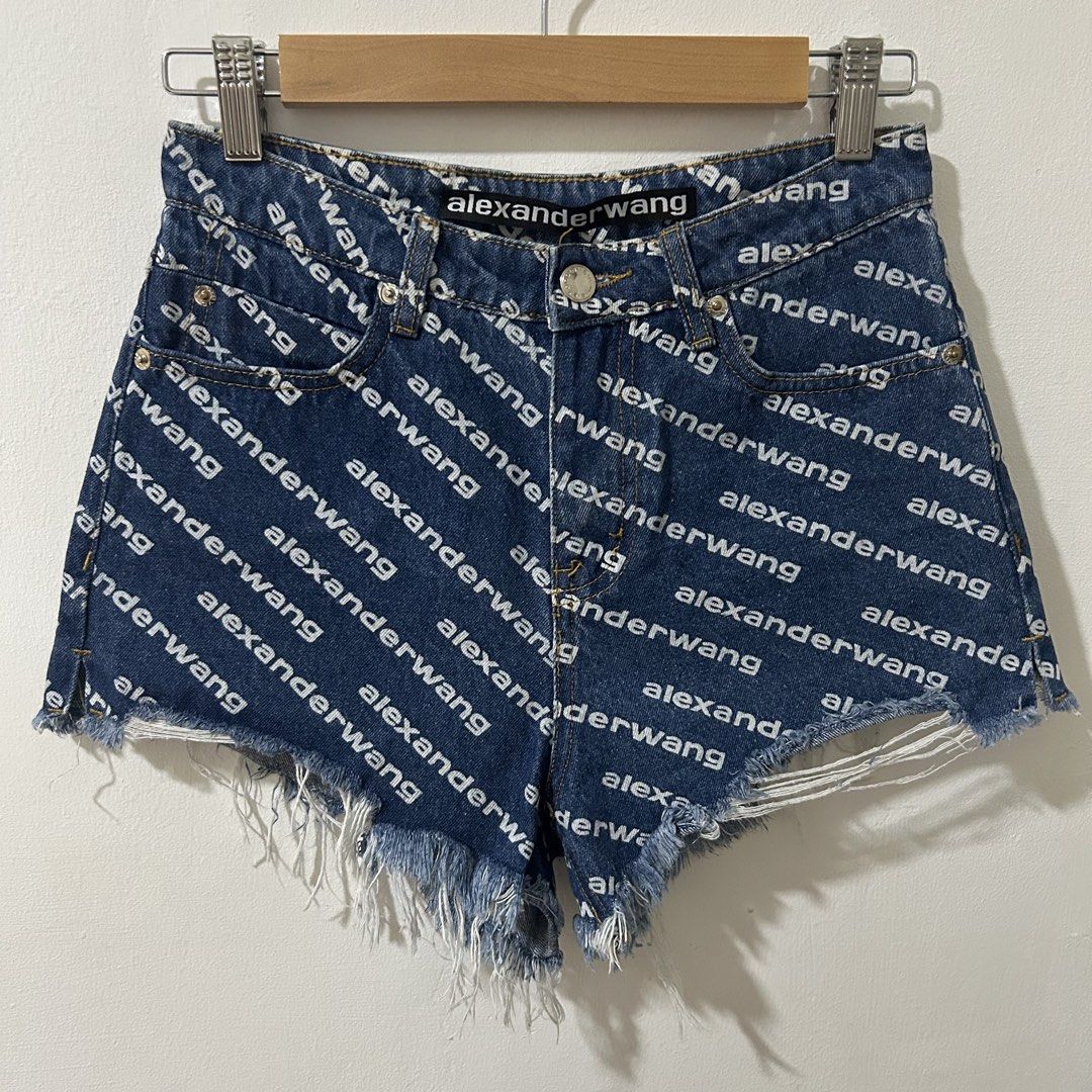 [27”] ALEXANDER WANG High Rise Cut Off Bite Denim Shorts (Category: Shorts) located in Tanza. Submitted by shop_qrated (Listing ID 1459478905, Image 2). Description: ALEXANDER WANG High Rise Cut Off Bite Denim Shorts. With side slits. 100% Cotton, non-stretch. Measures 27” via medida sizing. NGA. Clean and ready to wear. Logomania for the win. Printed with an all-over logo, these Bite denim shorts from Alexander Wang sit high at the waist and fea