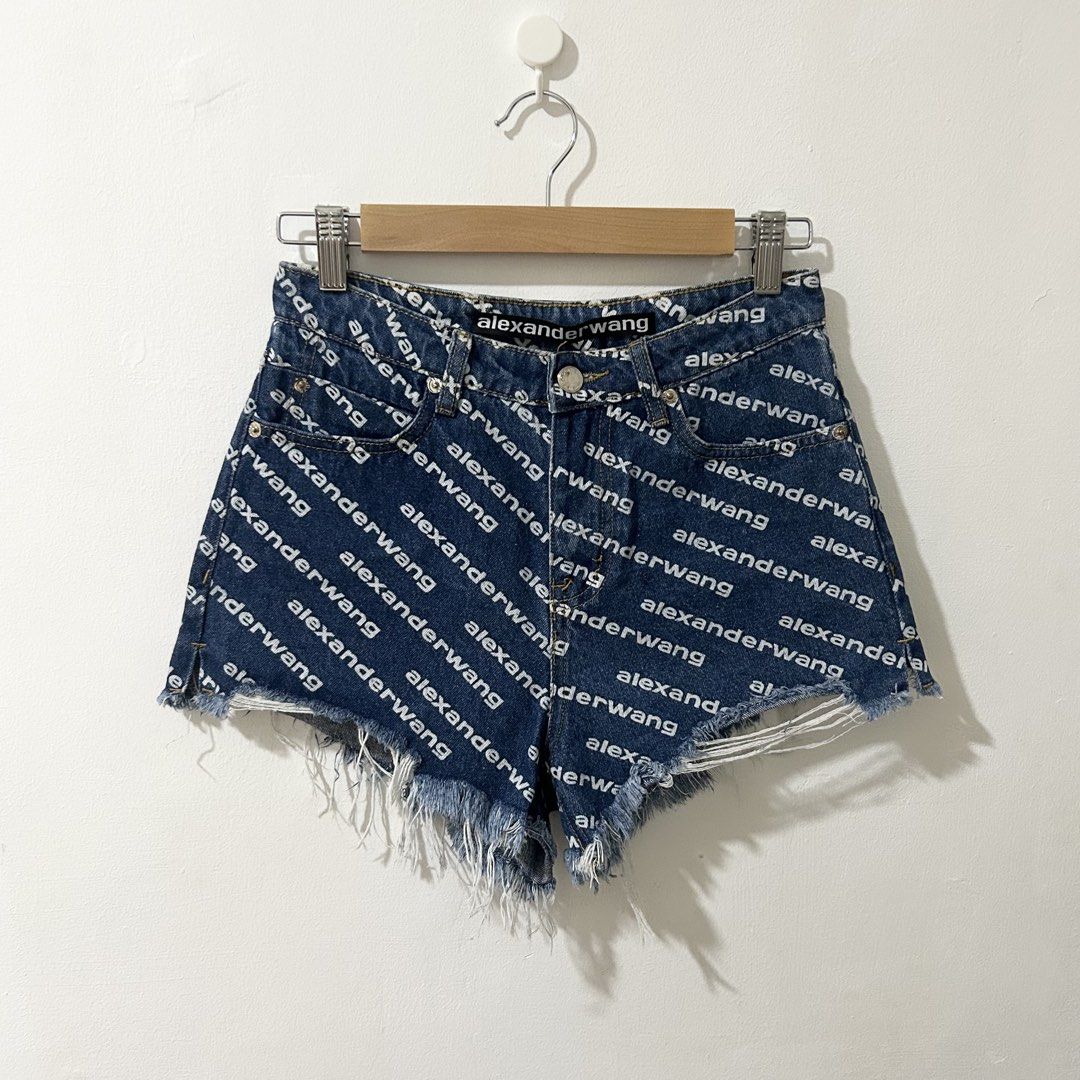 [27”] ALEXANDER WANG High Rise Cut Off Bite Denim Shorts (Category: Shorts) located in Tanza. Submitted by shop_qrated (Listing ID 1459478905, Image 1). Description: ALEXANDER WANG High Rise Cut Off Bite Denim Shorts. With side slits. 100% Cotton, non-stretch. Measures 27” via medida sizing. NGA. Clean and ready to wear. Logomania for the win. Printed with an all-over logo, these Bite denim shorts from Alexander Wang sit high at the waist and fea