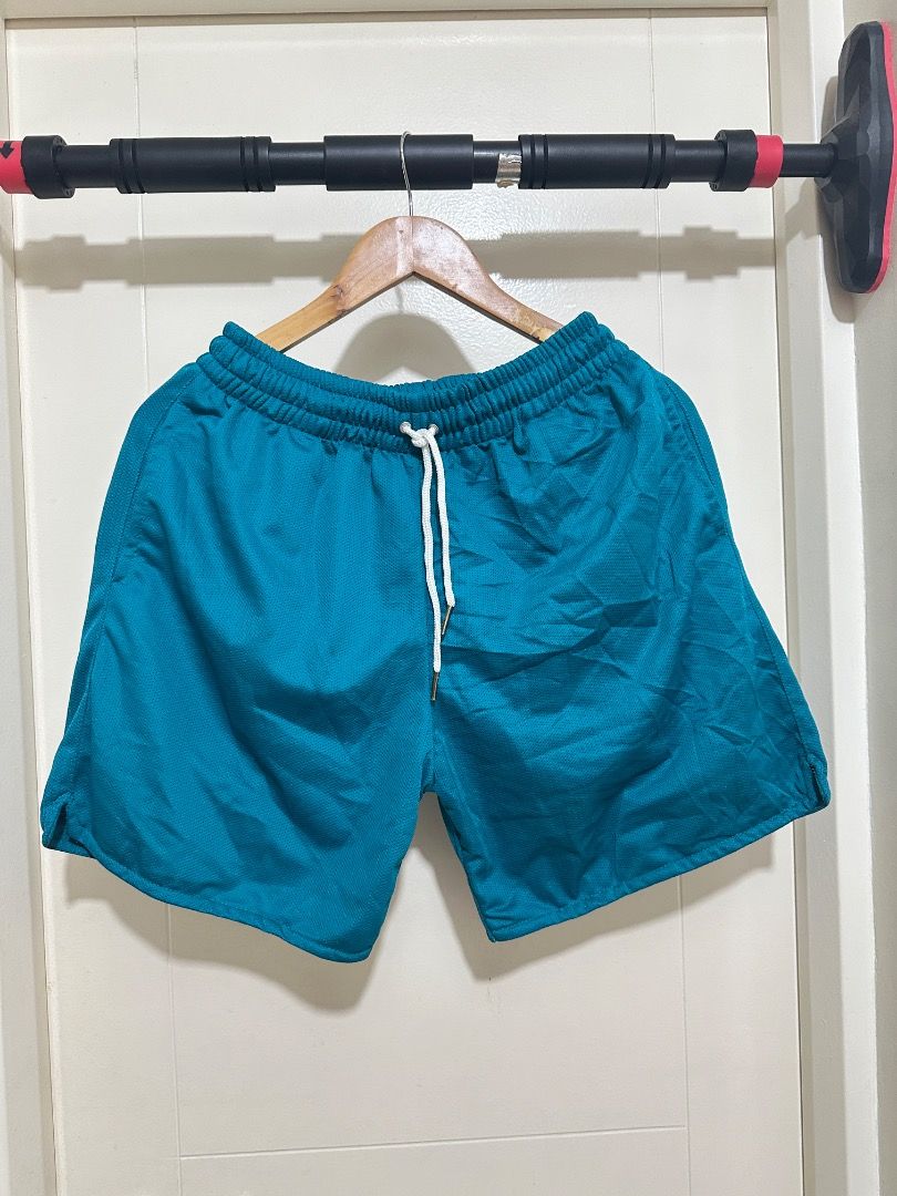 4pcs Teal Elastic Waist Shorts with Drawstring (Category: Activewear) located in Mandaluyong City. Submitted by lovedbyjaaaam (Listing ID 1459302618, Image 2). Description: -2pcs Small -1pc Large -1pc XL -250 each -600 take all - Teal shorts with a subtle textured pattern - Comfortable elastic waistband with a white drawstring - Ideal for lounging and light activities - Easy to style with various tops - Casual and versatile.
