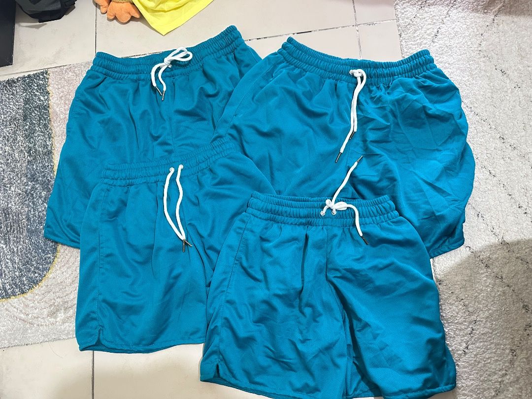 4pcs Teal Elastic Waist Shorts with Drawstring (Category: Activewear) located in Mandaluyong City. Submitted by lovedbyjaaaam (Listing ID 1459302618, Image 1). Description: -2pcs Small -1pc Large -1pc XL -250 each -600 take all - Teal shorts with a subtle textured pattern - Comfortable elastic waistband with a white drawstring - Ideal for lounging and light activities - Easy to style with various tops - Casual and versatile.