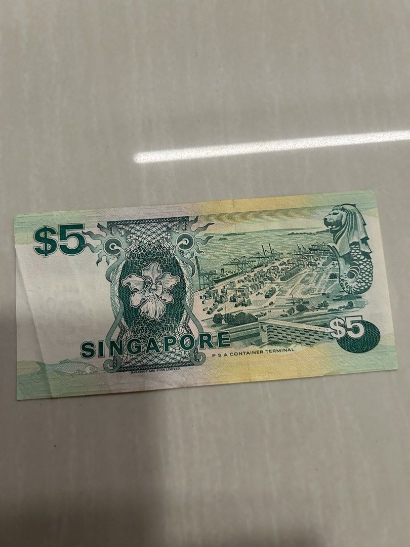 $5 notes (Category: Currency) located in Singapore. Submitted by hchsgd (Listing ID 1459428983, Image 2). Description: - Genuine Singapore $5 note - Legal tender - Features iconic Singaporean designs - Ideal for collectors or personal use.