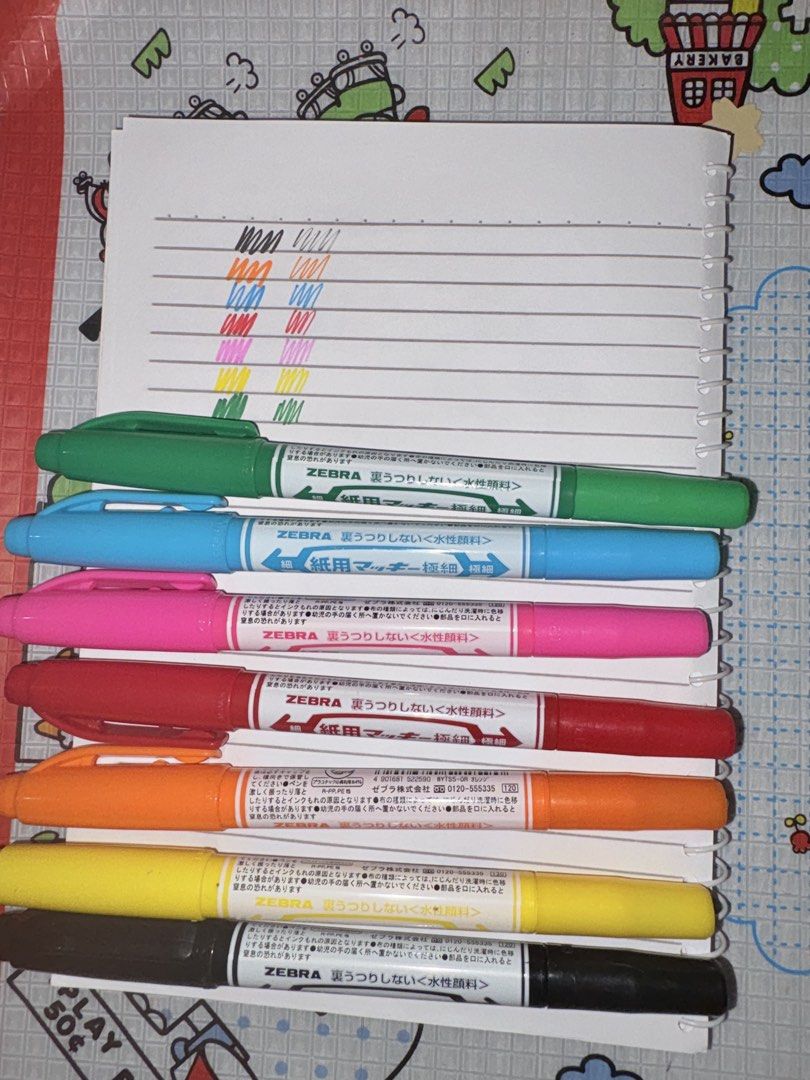 7pcs ZEBRA Paper Marker Water-Based Fine Tip Pens (Category: Stationery & School Supplies) located in Marikina City. Submitted by savedbygracephb (Listing ID 1459482673, Image 2). Description: - Set of 7 Zebra paper markers - Includes: Black, Yellow, Orange, Red, Pink, Blue, Green - Black fine tip not as juicy, all else are juicy as new - Fine tip, water-based ink - Ink is bleed-proof, won't go through paper - Ideal for highlighting and drawing.