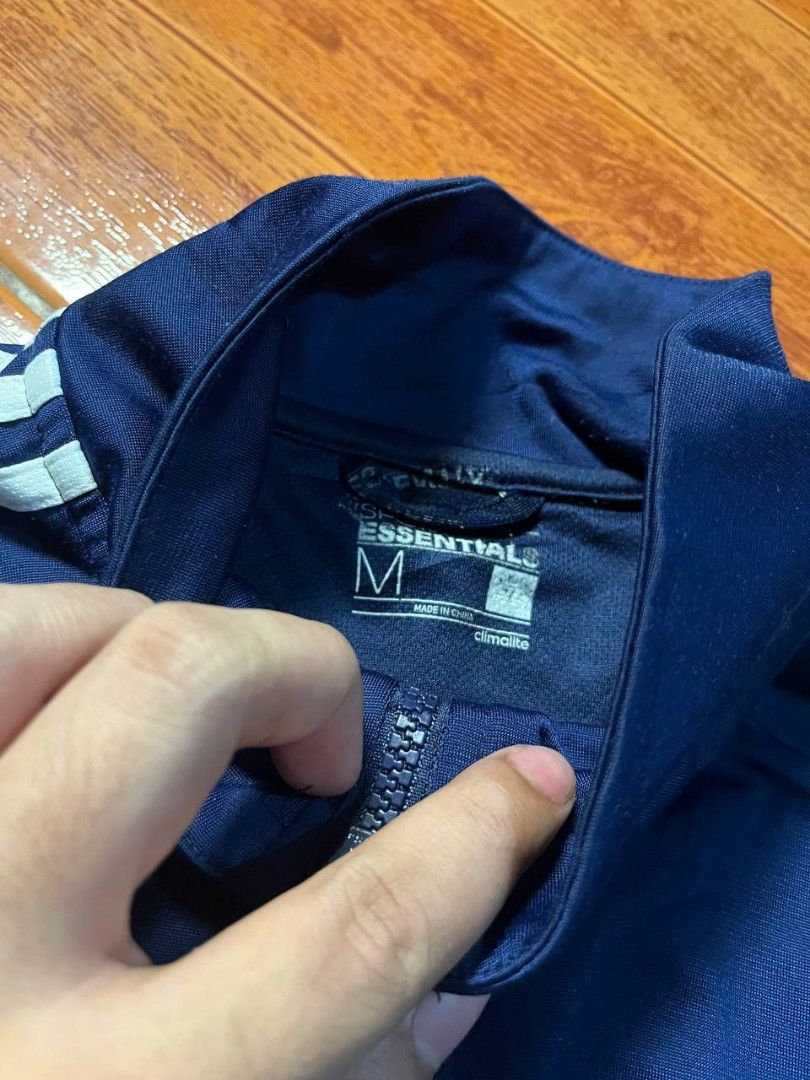 Adidas 3 stripe track jacket (Category: Coats, Jackets and Outerwear) located in Quezon City. Submitted by thomosssss (Listing ID 1459473567, Image 3). Description: ‎Adidas tracksuit navy blue 3 stripe ‎Dimes 26.5 by 20.5 ‎📌Print tag no issue tight ribbings as new condition 2 pockets on front authentic.