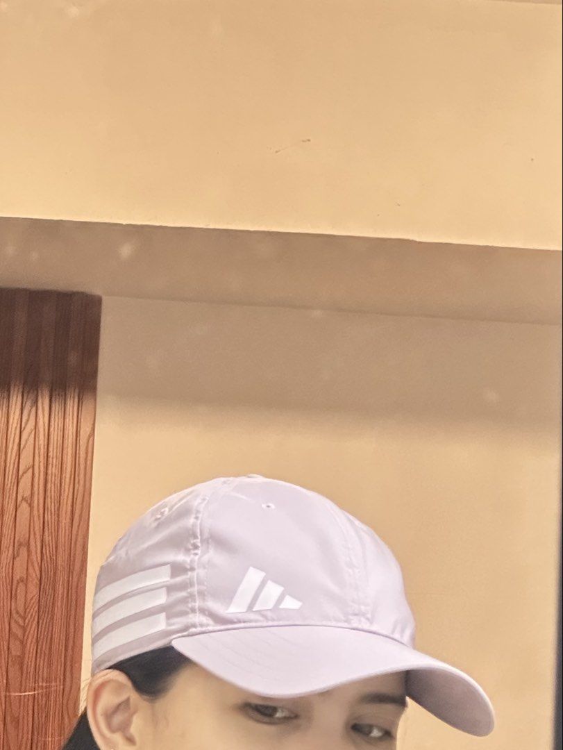 Adidas Cap(Original) (Category: Caps & Hats) located in General Trias. Submitted by keiperry_ (Listing ID 1459385308, Image 1). Description: - Unisex -Light purple Adidas cap - Classic three-stripe design on the brim - Adjustable strap at the back for a comfortable fit - Ideal for sunny days or casual wear - Easy to match with any outfit.