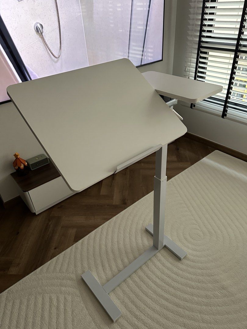 Adjustable foldable Table (Category: Tables & Sets) located in Singapore. Submitted by chai89s (Listing ID 1459490570, Image 3). Description: Brand New table Bought from Taobao and come wrong colour So wish to sell it. Original price $38.