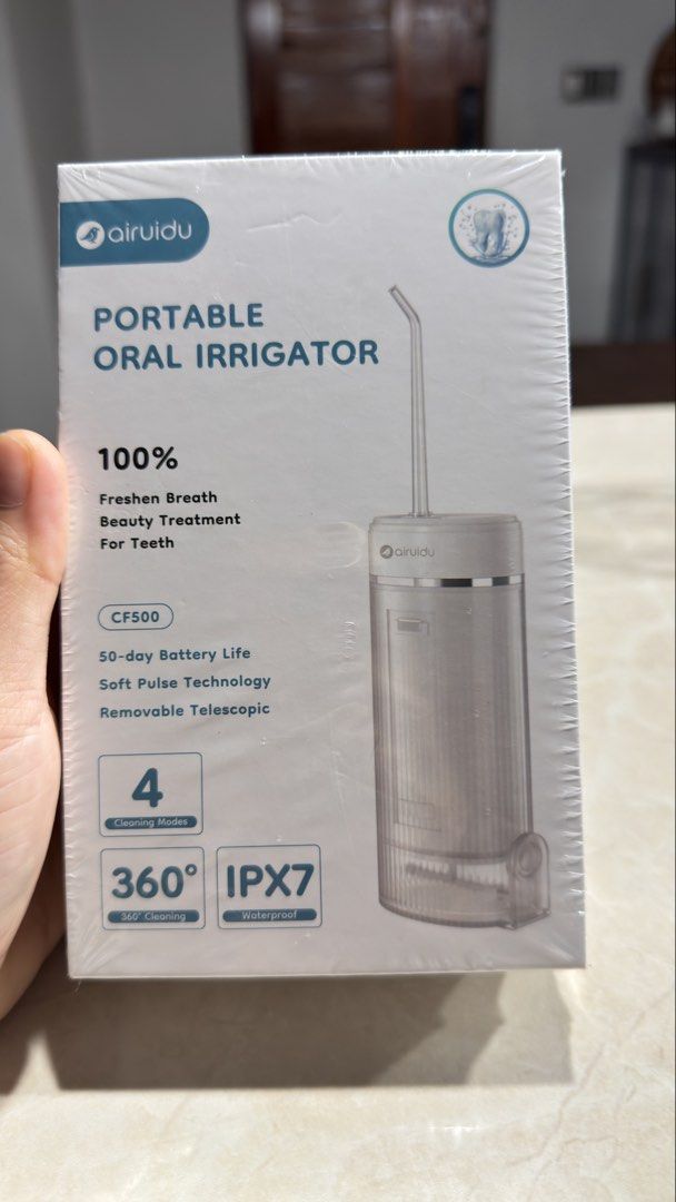 Airuidu Portable Oral Irrigator CF500 (Category: Oral Care) located in Manila. Submitted by noelynwali10524 (Listing ID 1459371811, Image 1). Description: Note: buyers pay shipping fee - Brand New Airuidu CF500 Portable Oral Irrigator - 4 Professional Cleaning Modes - Long-lasting 50-Day Battery Life - IPX7 Waterproof Design - Includes 4 Specialized Nozzles: Standard, Orthodontic, Periodontal, Tongue Scraper - Quick 3-Hour Charging Time - Ideal f