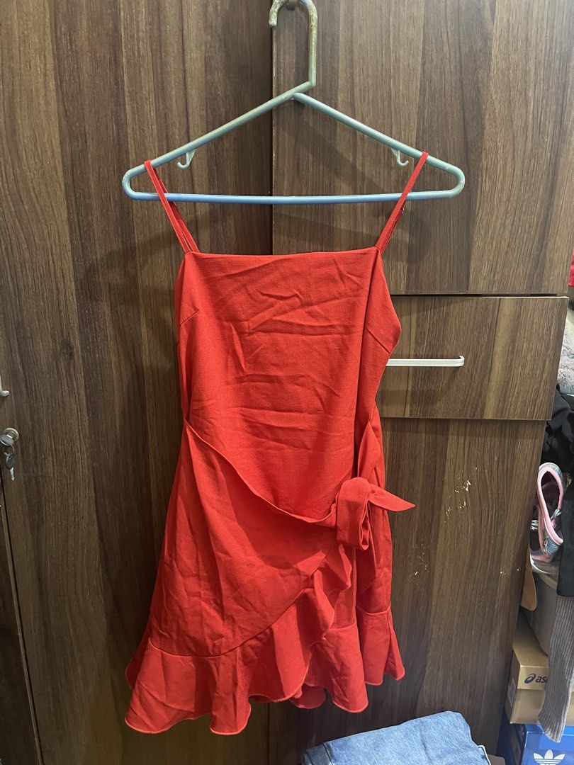 Ally Ruffle Wrap Mini Dress (Category: Dresses) located in Manila. Submitted by eunicemarzan (Listing ID 1459434601, Image 3). Description: Used once Size: M on tag (28-29waist) SDD/J&T okie.