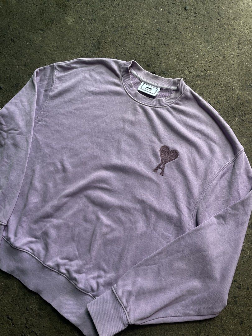 Ami Paris sweatshirt (Category: Luxury Apparel) located in Bocaue. Submitted by mosthighcollective (Listing ID 1459388161, Image 1). Description: Ami Paris sweatshirt Size: M to L Dimes: 21 width 25.5 length Excellent condition No issue 1000 only Dm me to purchase 📥.
