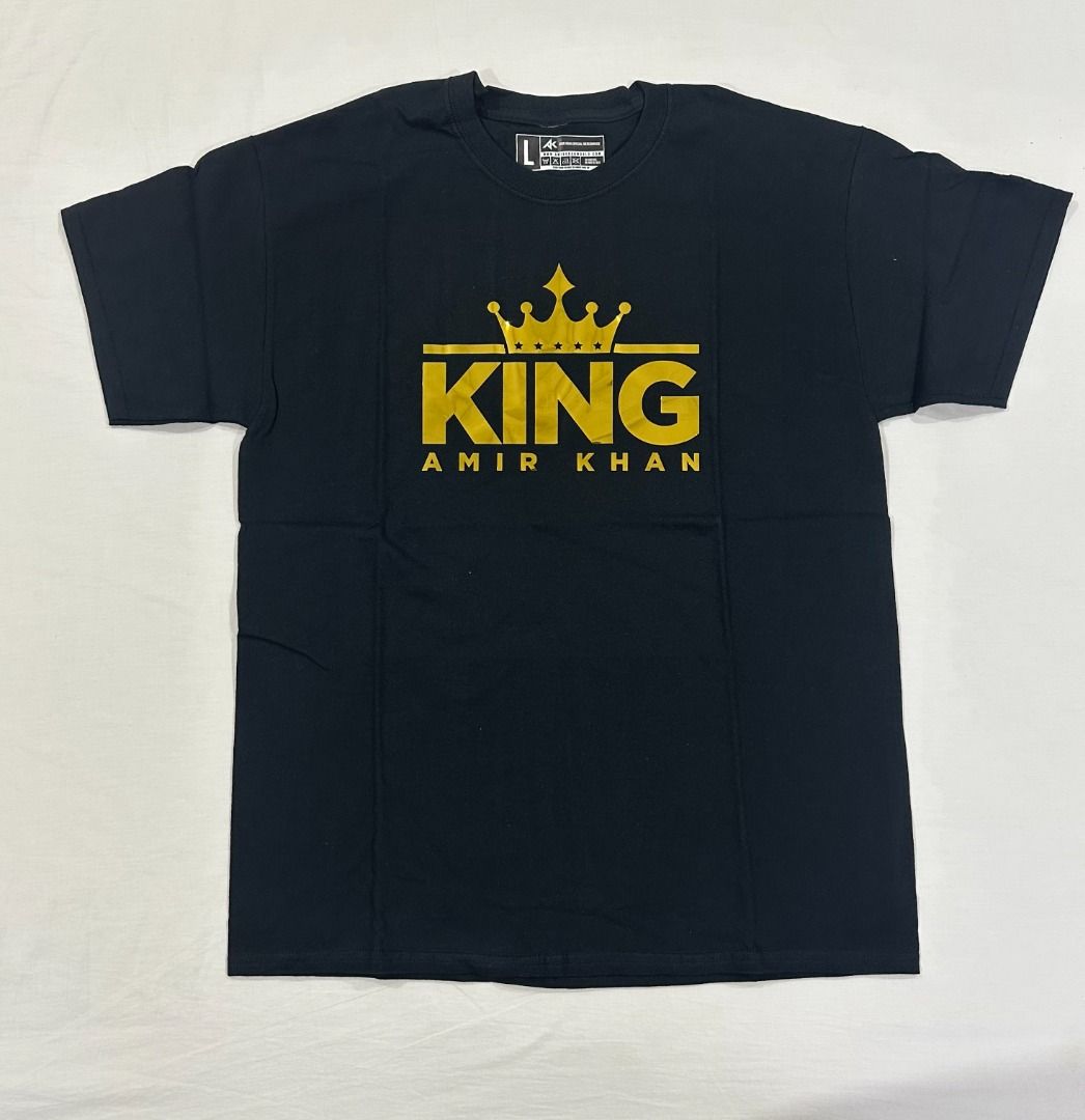 Amir Khan King Black T-Shirt Large (Category: Tshirts & Polo Shirts ) located in San Juan City. Submitted by looneyc (Listing ID 1459366864, Image 2). Description: - Black t-shirt with 'King Amir Khan' gold graphic print - Crew neck, short sleeves - Ideal for fans of Amir Khan - Measurements: Length approx 75cm, Width approx 55cm Gifted. Brand New. Never Used. Just in Storage. WYSIWYG. ***ITEM IS AVAILABLE IF YOU CAN SEE THIS MESSAGE. Please avoi