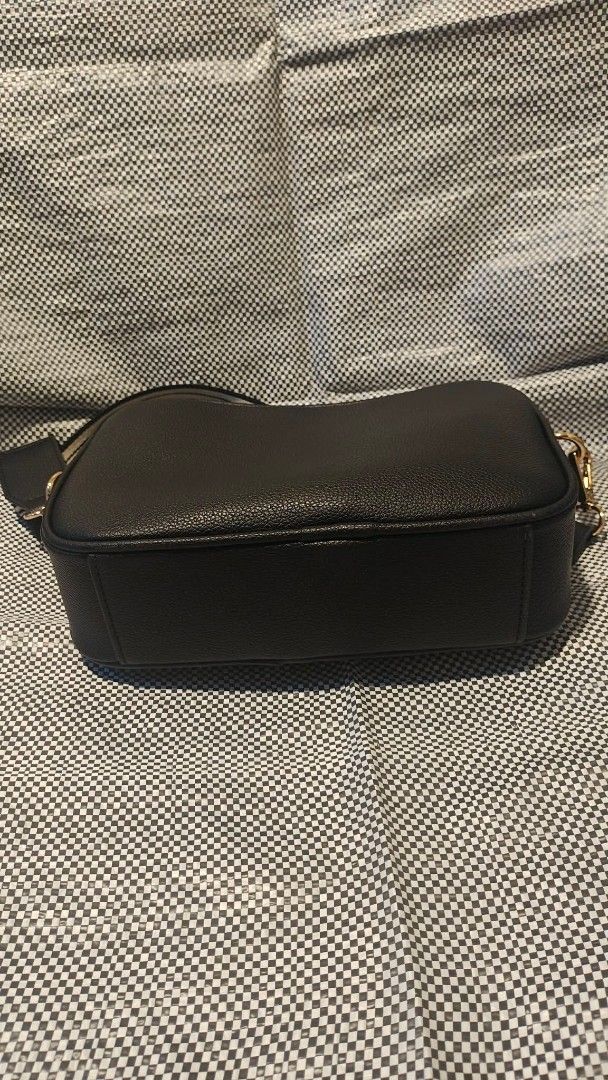 Anne Klein Black Leather Crossbody Bag (Category: Cross-body Bags) located in Manila. Submitted by thechecklistph (Listing ID 1459436615, Image 3). Description: - Brand: Anne Klein - Material: Black Leather - Closure: Zip-around - Strap: Detachable with Anne Klein logo - Ideal for: Everyday use - Bought in UAE Pick up or shipping c/o buyer .