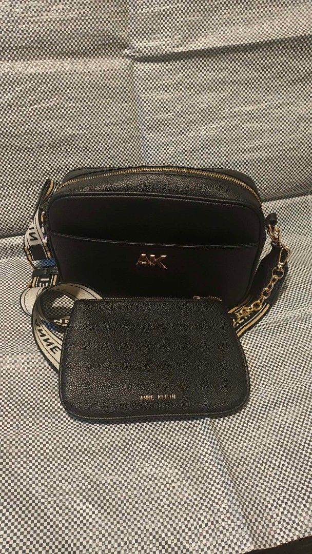 Anne Klein Black Leather Crossbody Bag (Category: Cross-body Bags) located in Manila. Submitted by thechecklistph (Listing ID 1459436615, Image 1). Description: - Brand: Anne Klein - Material: Black Leather - Closure: Zip-around - Strap: Detachable with Anne Klein logo - Ideal for: Everyday use - Bought in UAE Pick up or shipping c/o buyer .